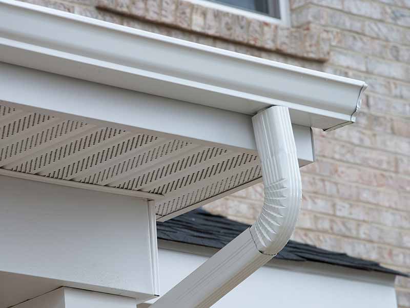 White k-style gutters on a home